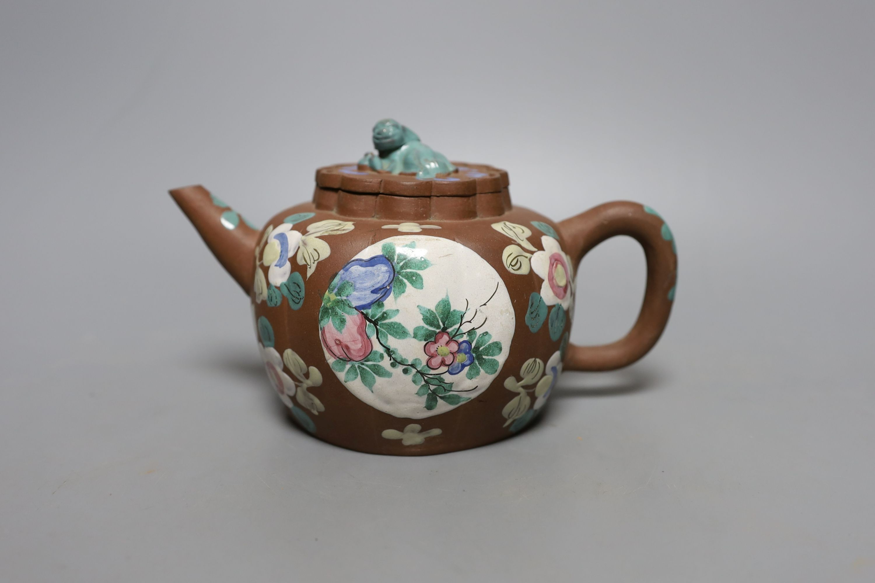 A Chinese Yixing enamelled teapot and cover - 12.5cm tall